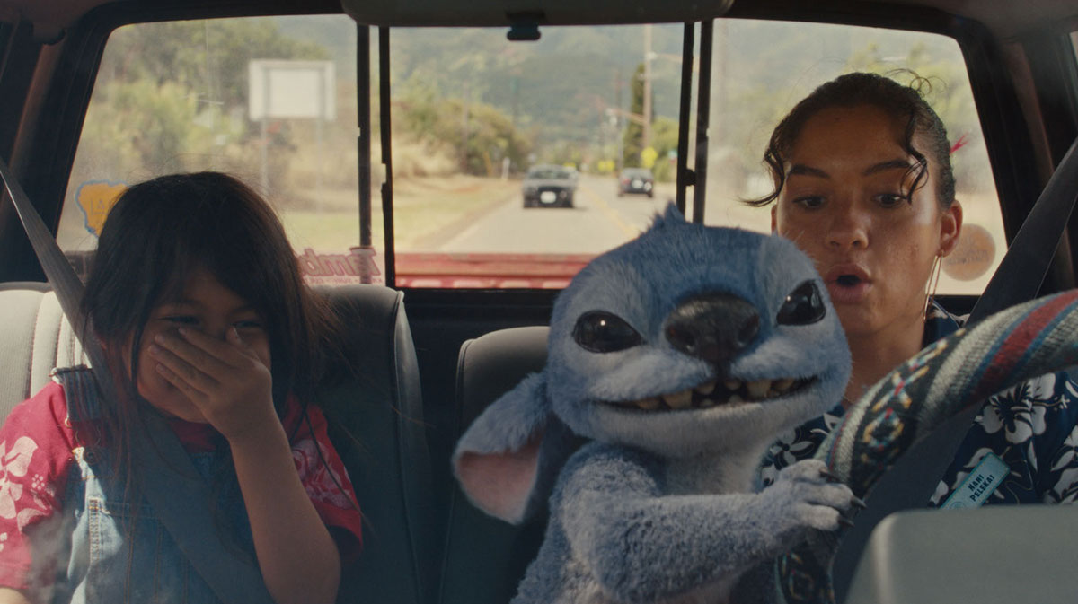 Maia Kealoha, Chris Sanders, and Sydney Elizebeth Agudong in Lilo & Stitch.