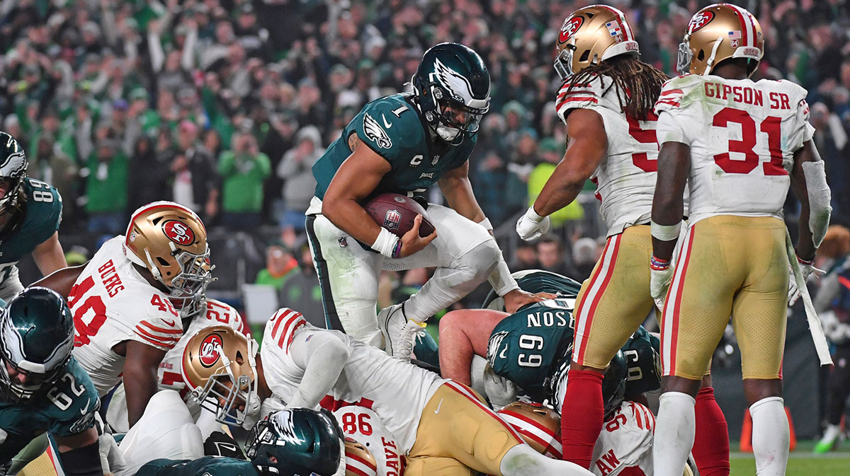 Philadelphia Eagles quarterback Jalen Hurts (1) scores a touchdown against the San Francisco 49ers during the third quarter at Lincoln Financial Field.