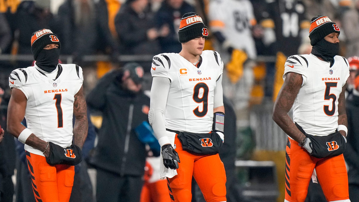Cincinnati Bengals wide receiver Ja'Marr Chase (1), quarterback Joe Burrow (9) and wide receiver Tee Higgins (5) take the field as captains for the coin toss before the first quarter of the NFL Week 18 game between the Pittsburgh Steelers and the Cincinnati Bengals at Acrisure Stadium in Pittsburgh on Saturday, Jan. 4, 2025.