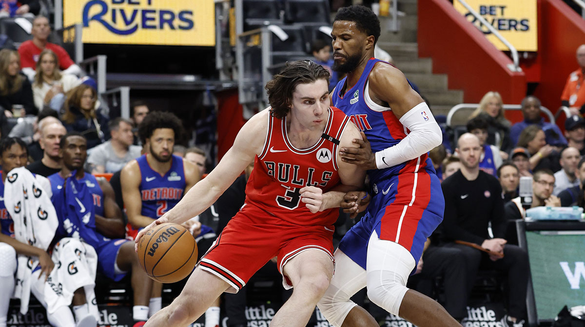 Feb 2, 2025; Detroit, Michigan, USA; Chicago Bulls guard Josh Giddey (3) dribbles defended by Detroit Pistons guard Malik Beasley (5) in the first half at Little Caesars Arena. Mandatory Credit: Rick Osentoski-Imagn Images