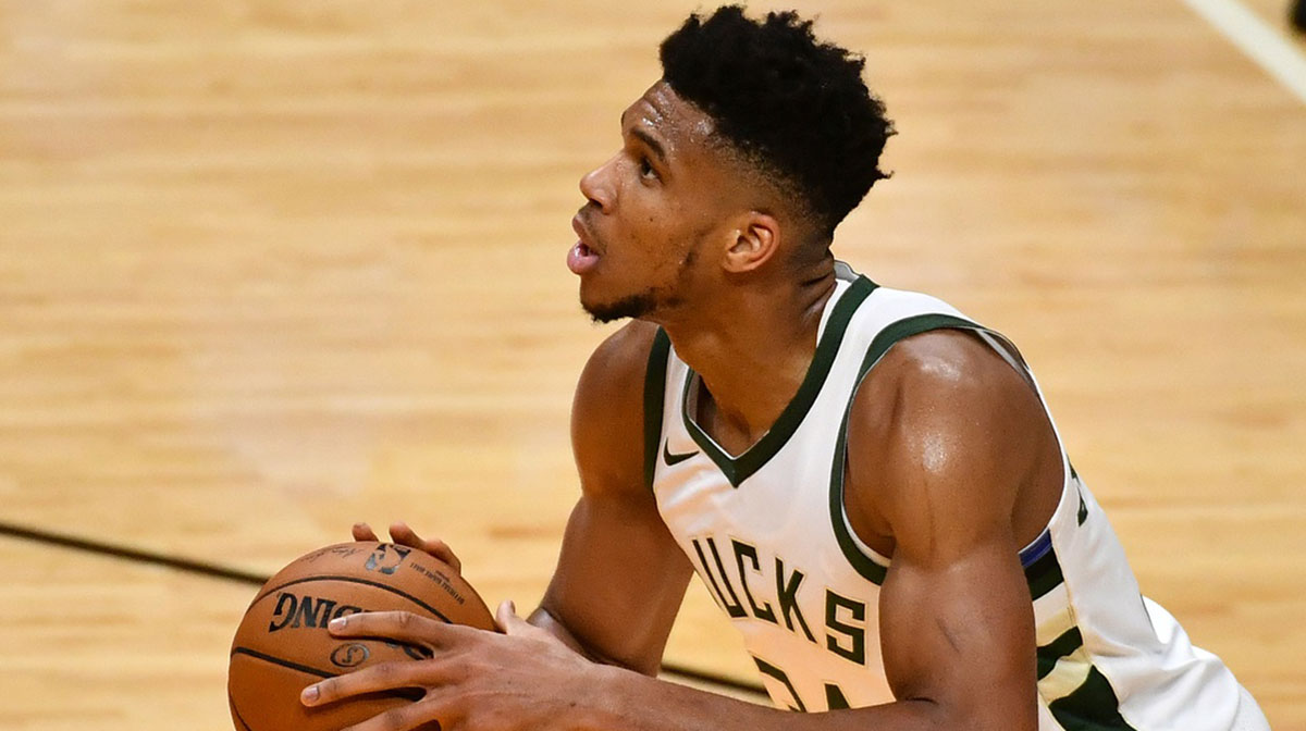 Milwaukee Bucks forward Giannis Antetokounmpo (34) attempts a free-throw during the second half against the Miami Heat at American Airlines Arena.