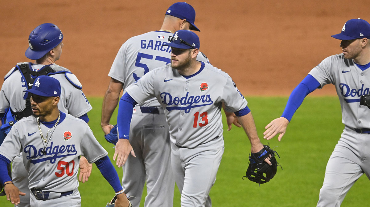 The Los Angeles Dodgers celebrate a win over the Cleveland Guardians at Progressive Field.