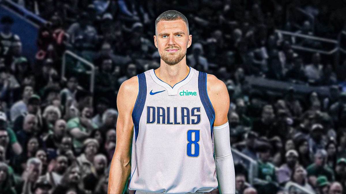 Kristaps Porzingis photoshopped in Magic jersey. Include his jersey number.