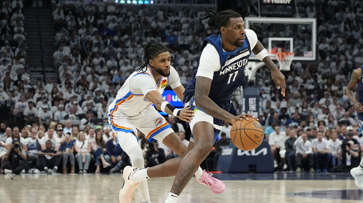 Minnesota Timberwolves center Naz Reid (11) dribbles the ball against the Oklahoma City Thunder in the second half during game four of the western conference finals for the 2025 NBA Playoffs at Target Center.