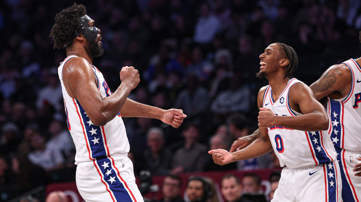 76ers center Joel Embiid (21) celebrates with guard Tyrese Maxey