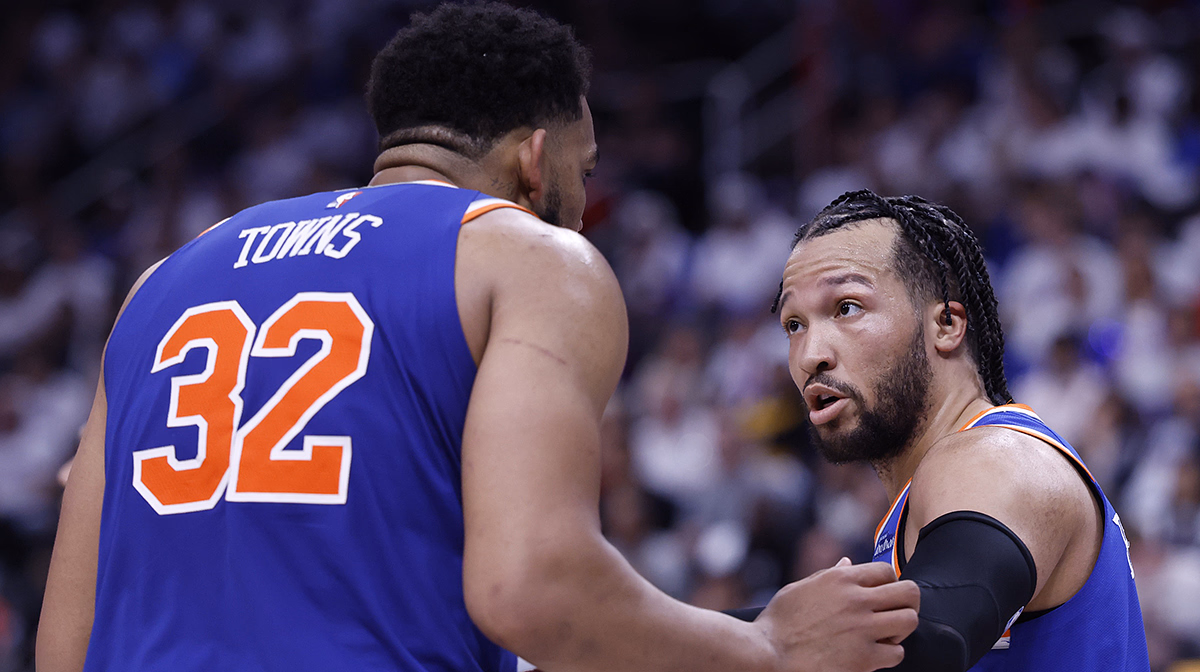 New York Knicks guard Jalen Brunson (11) talks to center Karl-Anthony Towns (32) in the second half against the Detroit Pistons during game six of first round for the 2024 NBA Playoffs at Little Caesars Arena.