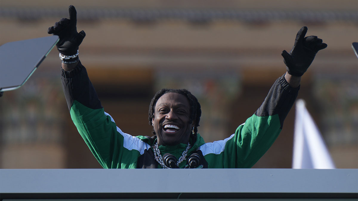 A.J. Brown, whose proposal to his girlfriend Kelsey Riley included a John Legend performance, during the Eagles' Super Bowl parade
