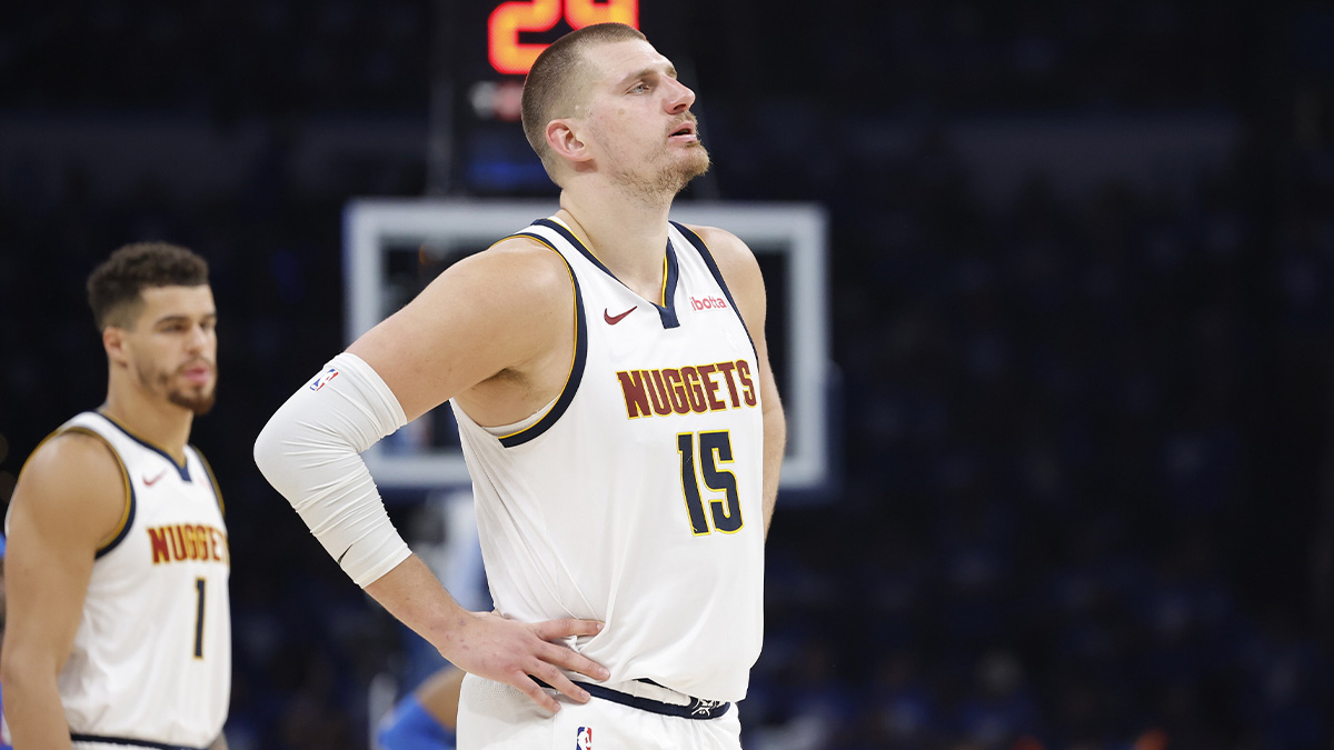 Denver Nuggets center Nikola Jokic (15) watches Oklahoma City Thunder guard Shai Gilgeous-Alexander shoot free throws in the second half of game seven of the second round for the 2025 NBA Playoffs at Paycom Center.