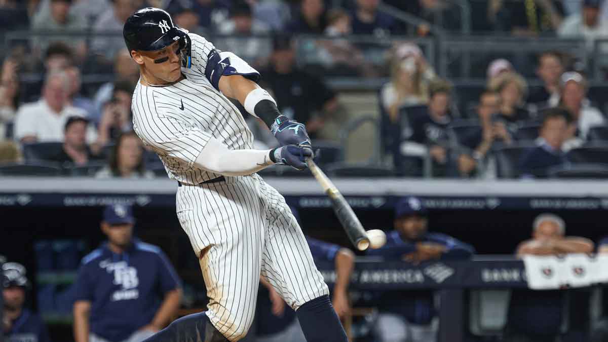 New York Yankees right fielder Aaron Judge (99) doubles during the fifth inning against the Tampa Bay Rays at Yankee Stadium.