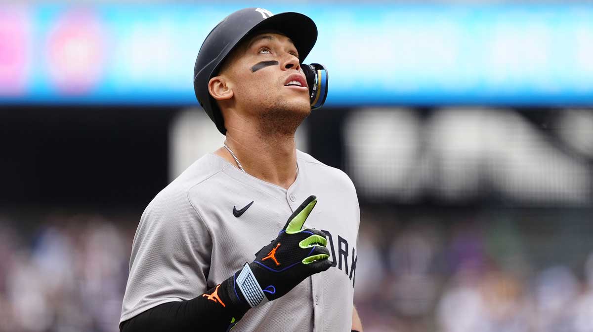 May 24, 2025; Denver, Colorado, USA; New York Yankees right fielder Aaron Judge (99) runs off solo home run in the first inning against the Colorado Rockies at Coors Field. Mandatory Credit: Ron Chenoy-Imagn Images