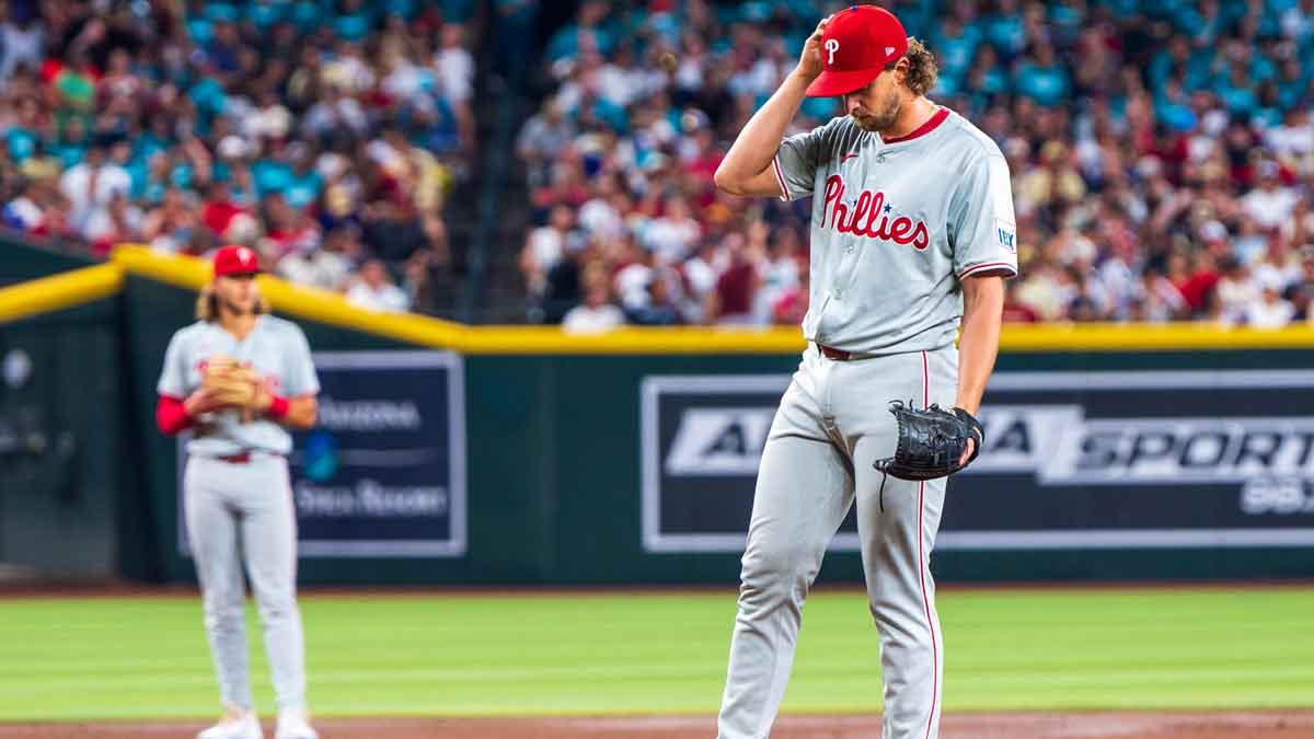 Philadelphia Phillies pitcher Aaron Nola (27) reacts after giving up a home run to Arizona Diamondbacks infielder Ketel Marte (4) (not shown) in the first inning.