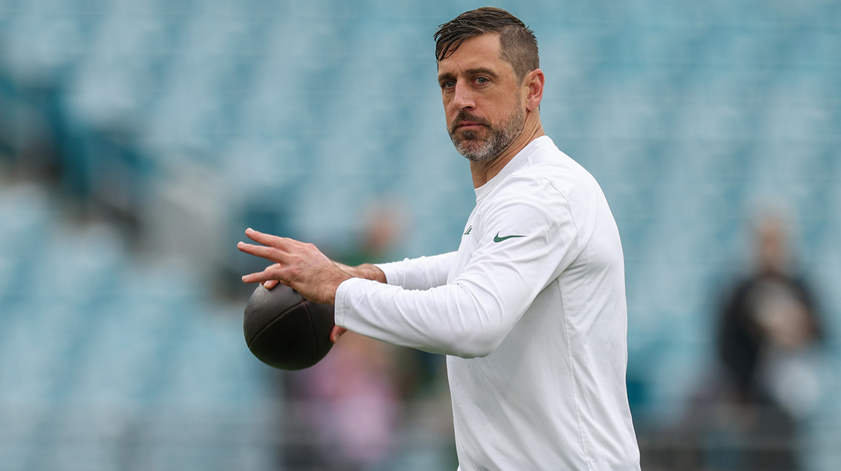 New York Jets quarterback Aaron Rodgers (8) warms up before a game against the Jacksonville Jaguars at EverBank Stadium.