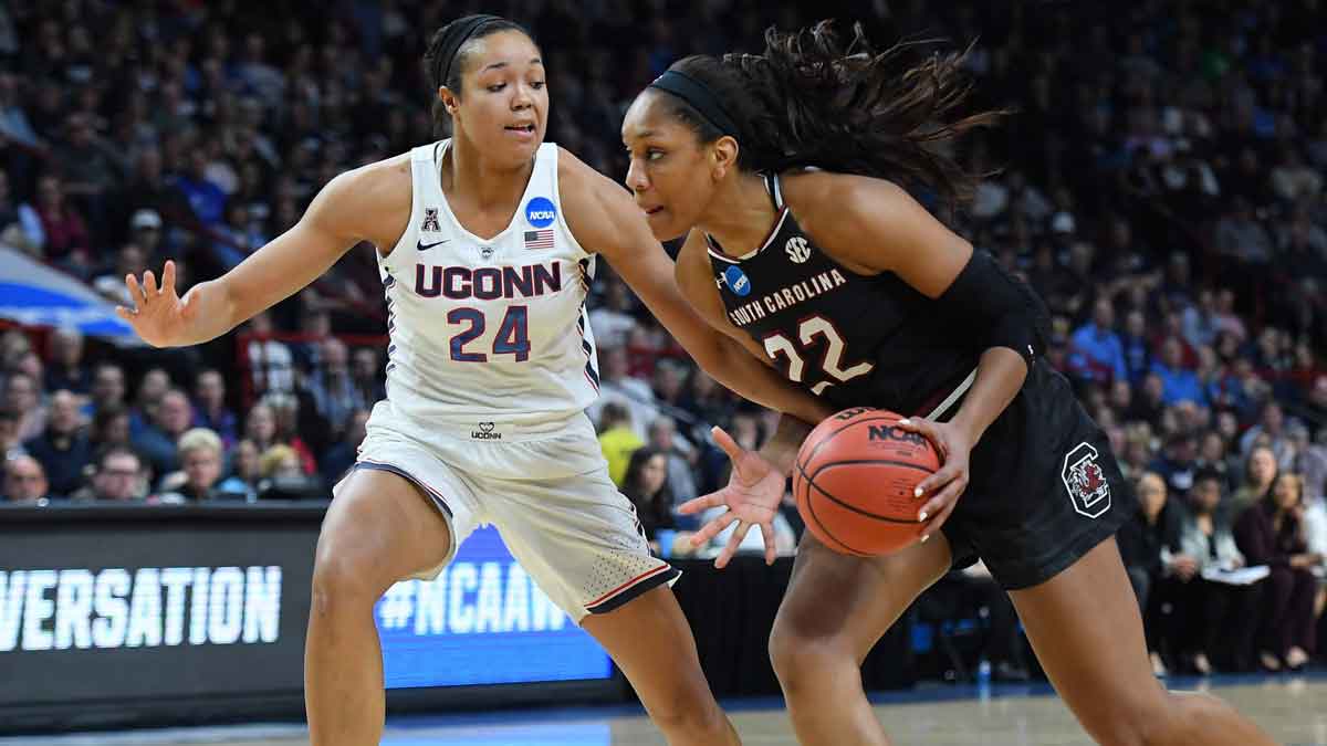 South Carolina and Aces forward A'ja Wilson dribbles the ball past UConn forward Napheesa Collier during the first half in the championship game of the Albany regional of the women's basketball 2018 NCAA Tournament at the Times Union Center.