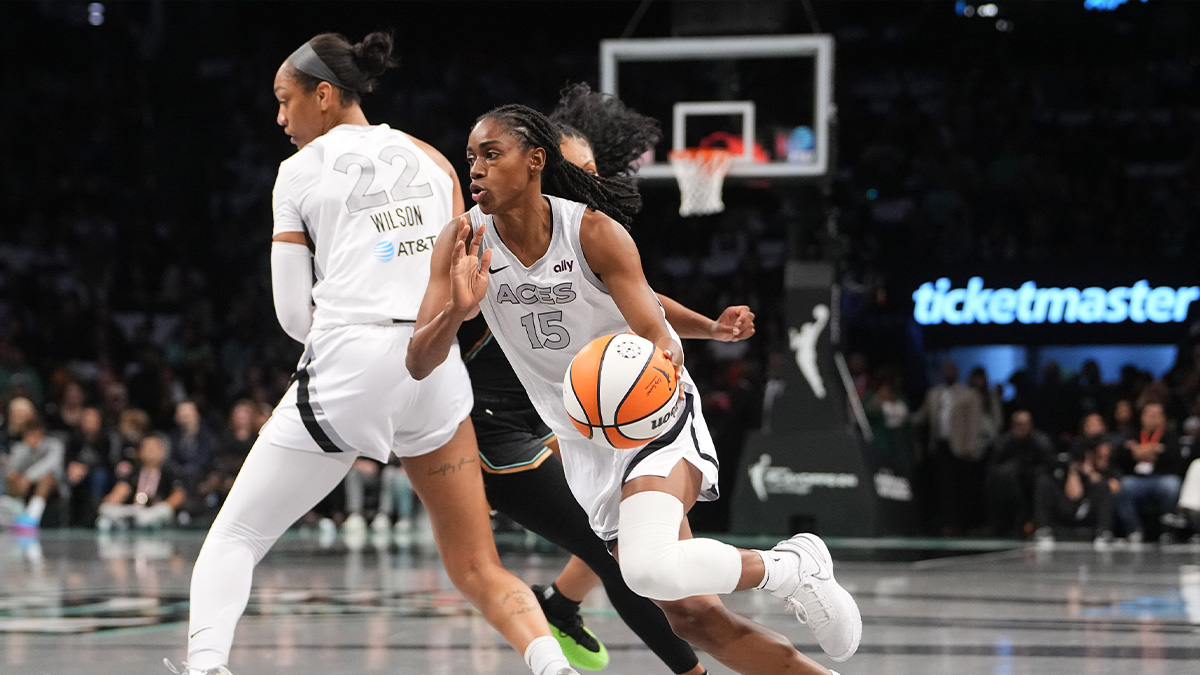 Sep 29, 2024; Brooklyn, New York, USA; Las Vegas Aces guard Tiffany Hayes (15) dribbles the ball toward the basket against the New York Liberty during game one of the 2024 WNBA Semi-finals at Barclays Center. Mandatory Credit: Gregory Fisher-Imagn Images