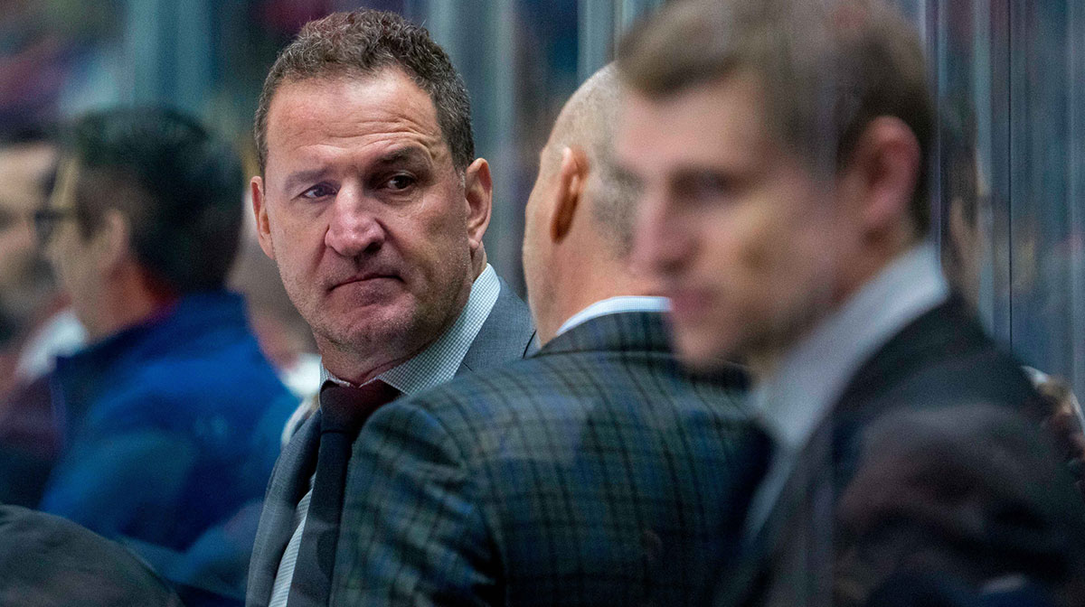 Vancouver Canucks assistant coach Adam Foote on the bench against the Edmonton Oilers in the second period at Rogers Arena.