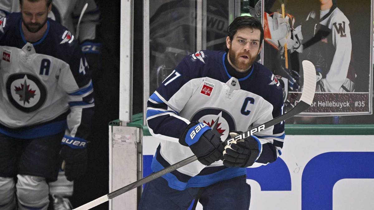 Winnipeg Jets center Adam Lowry (17) takes the ice to skate in warmups prior to the game against the Dallas Stars in game six of the second round of the 2025 Stanley Cup Playoffs at American Airlines Center.