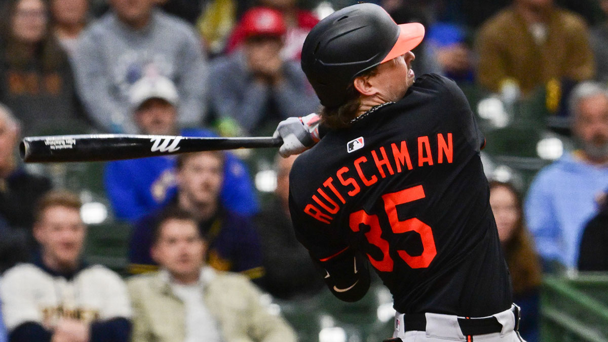 Baltimore Orioles catcher Adley Rutschman (35) hits a 3-run home run in the eleventh inning against the Milwaukee Brewers at American Family Field.