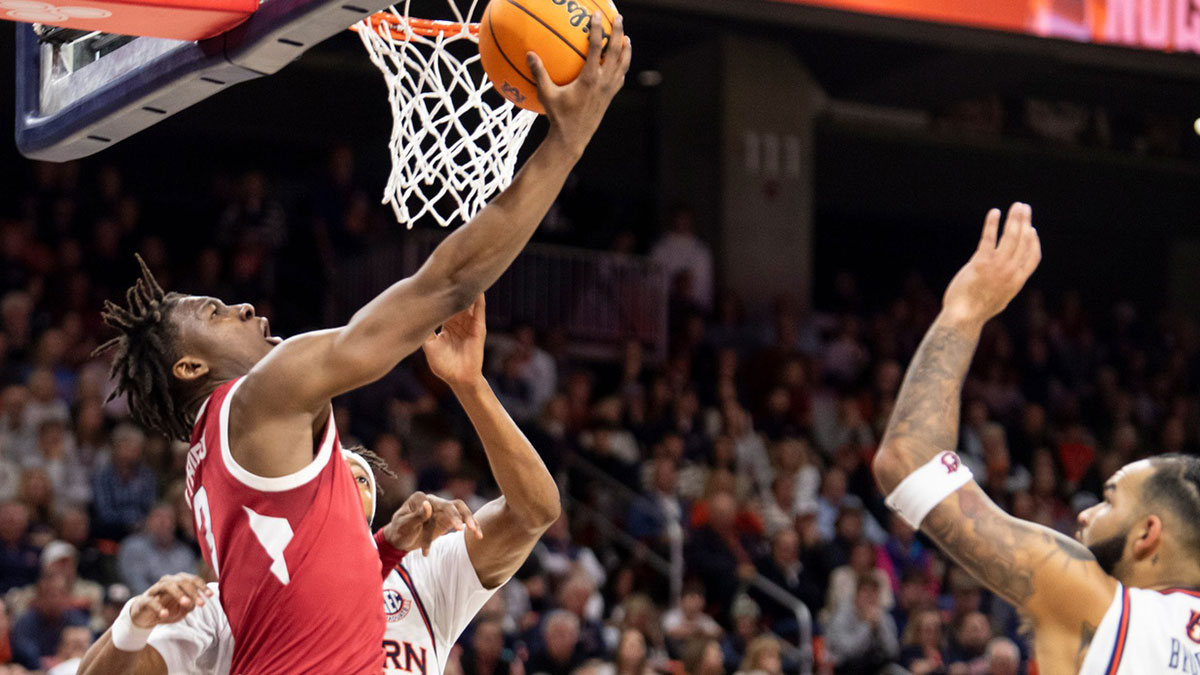 Arkansas Razorbacks forward Adou Thiero (3) goes up for a layup as Auburn Tigers take on Arkansas Razorbacks at Neville Arena