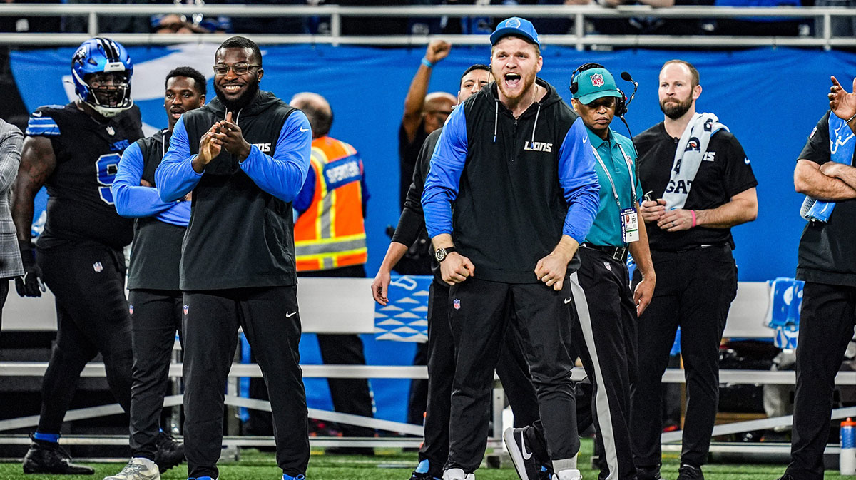 Detroit Lions Aidan Hutchinson watches play from the sidelines, during the second half at Ford Field in Detroit on Sunday, Jan. 5, 2025.