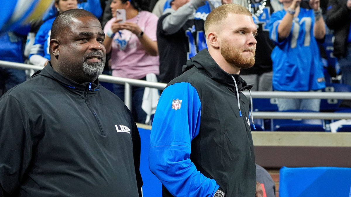 Detroit Lions defensive end Aidan Hutchinson (97) takes the field to watch warm up before the NFC divisional round between Detroit Lions and Washington Commanders at Ford Field in Detroit on Saturday, Jan. 18, 2025.