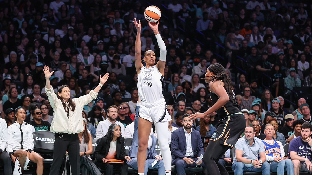 Las Vegas Aces center A'ja Wilson (22) takes a three point shot past New York Liberty center Jonquel Jones (35) in the first quarter at Barclays Center.