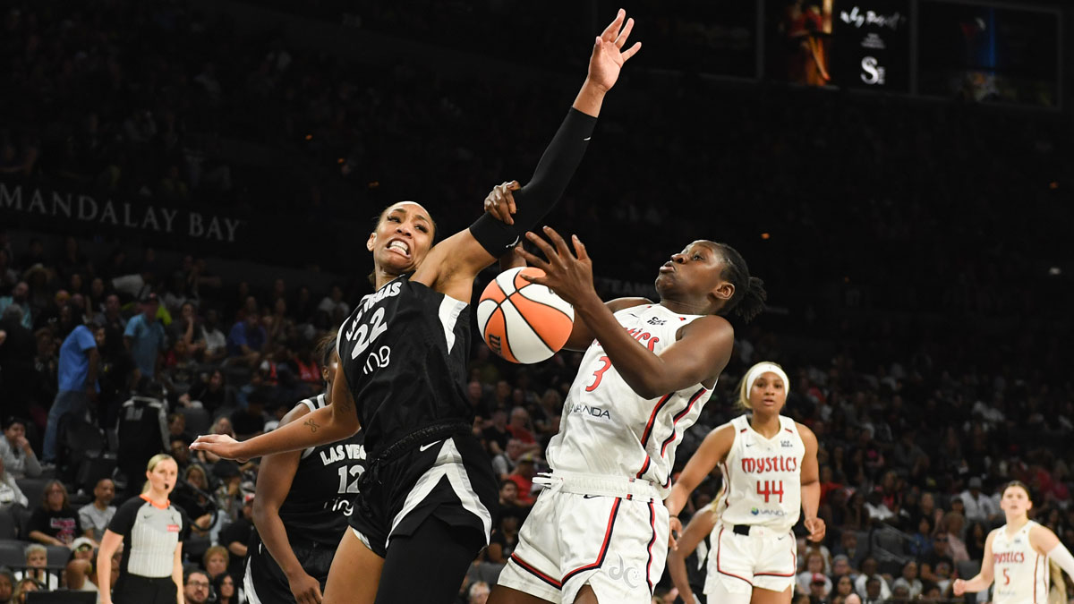Las Vegas Aces center A'ja Wilson (22) and Washington Mystics forward Sika Kone (3) battle for a rebound in the fourth quarter of their game at Michelob Ultra Arena.
