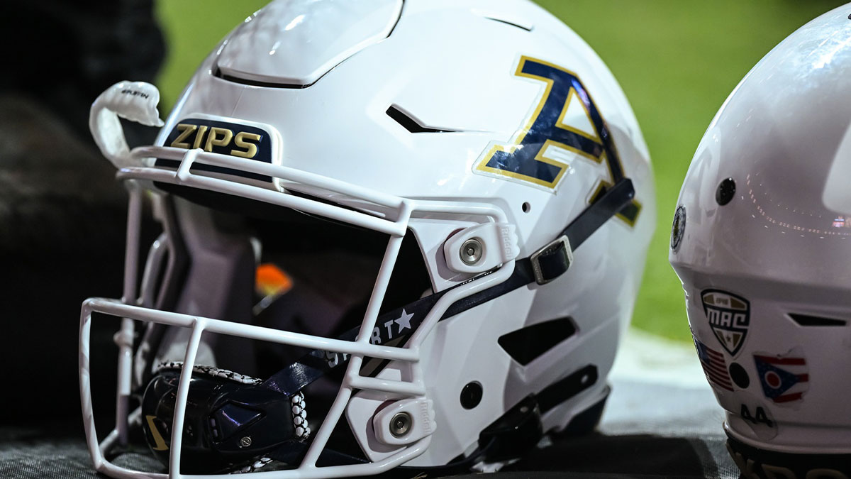 Akron Zips helmets sit on the sidelines in the game against the Tennessee Volunteers at Neyland Stadium