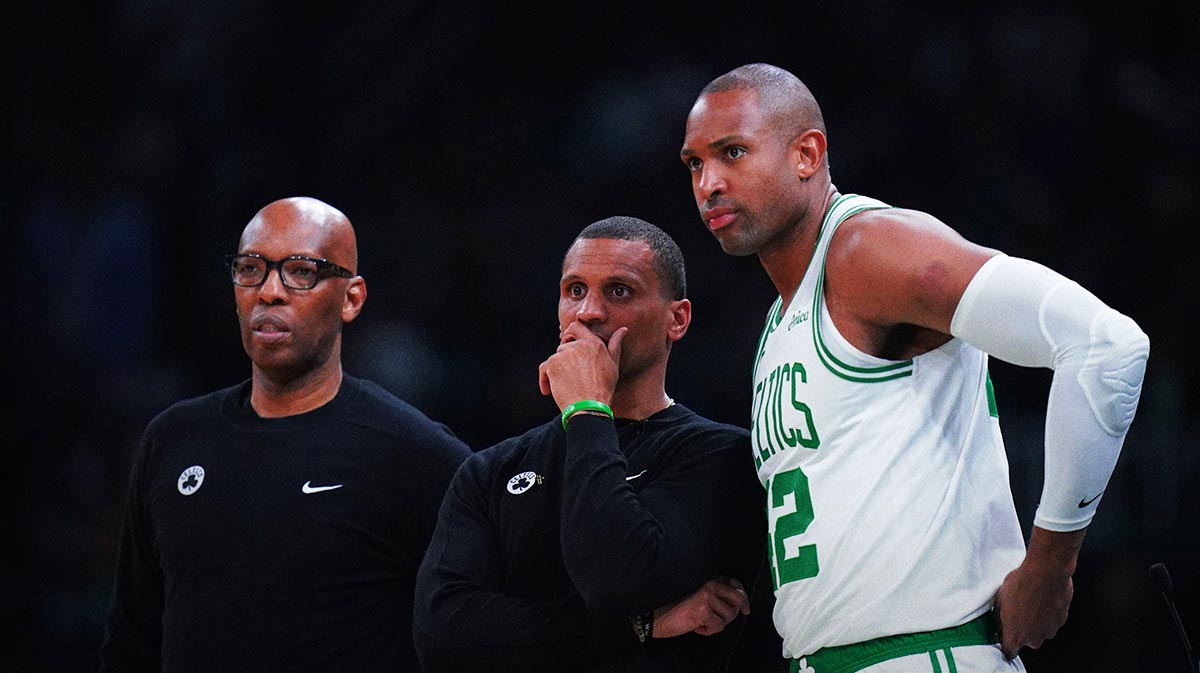 Boston Celtics head coach Joe Mazzulla talks with center Al Horford (42) from the sideline as they take on the New York Knicks during game one of the second round for the 2025 NBA Playoffs.