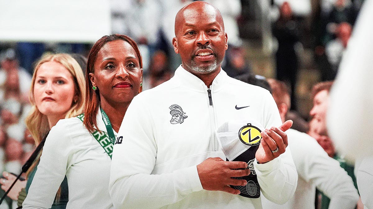 Michigan State athletic director Alan Haller watches senior celebration after 79-62 win over Michigan at Breslin Center