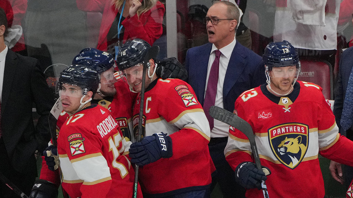 Florida Panthers center Aleksander Barkov (16) and right wing Vladimir Tarasenko (10) celebrate advancing to the second round of the playoffs as head coach Paul Maurice looks on against the Tampa Bay Lightning in game five of the first round of the 2024 Stanley Cup Playoffs at Amerant Bank Arena.