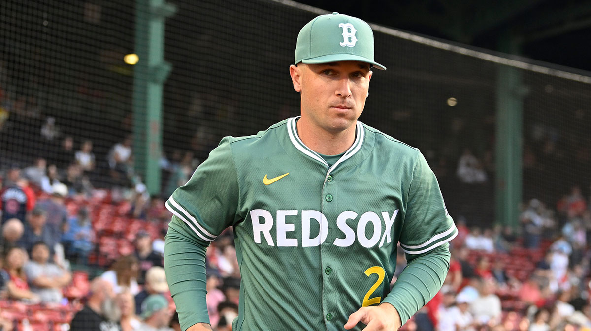 Boston Red Sox third baseman Alex Bregman (2) runs out of the dugout before the start of a game against the Atlanta Braves at Fenway Park.