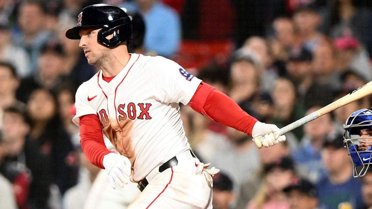 Boston Red Sox third baseman Alex Bregman (2) hits a two-run RBI single against the Texas Rangers during the seventh inning at Fenway Park.