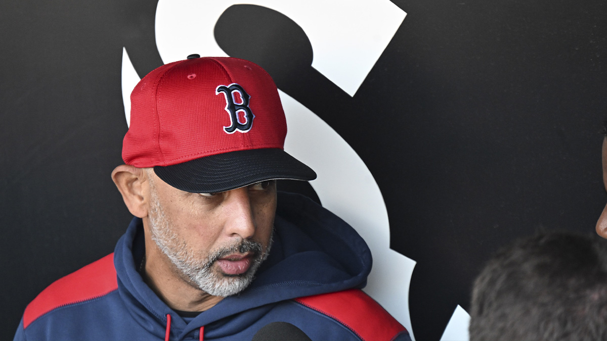 Boston Red Sox manager Alex Cora (13) talks with the media before the teamís game against the Chicago White Sox at Guaranteed Rate Field.