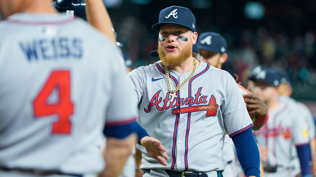 Apr 26, 2025; Phoenix, Arizona, USA; Atlanta Braves outfielder Alex Verdugo (8) celebrates with his team after beating the Arizona Diamondbacks 8-7 after ten innings at Chase Field.