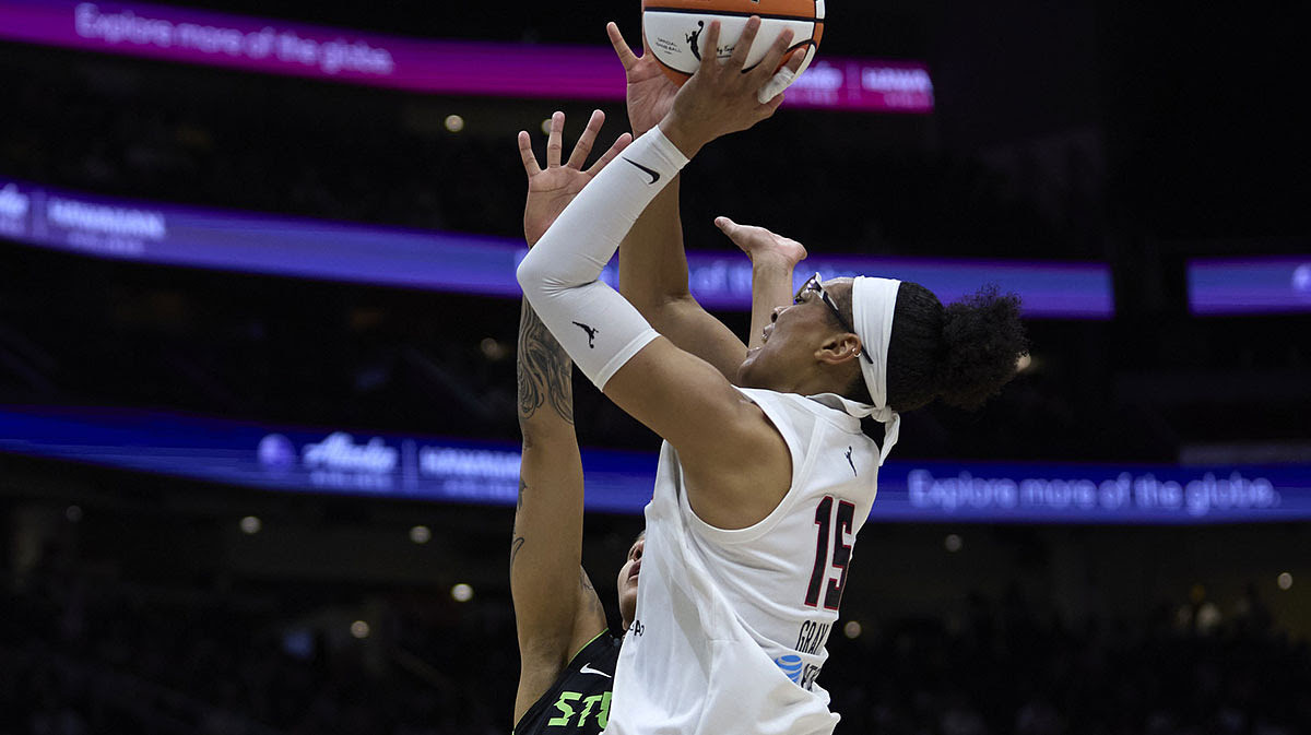 Atlanta Dream guard Allisha Gray (15) draws a foul from Seattle Storm forward Gabby Williams (5) during the second half.