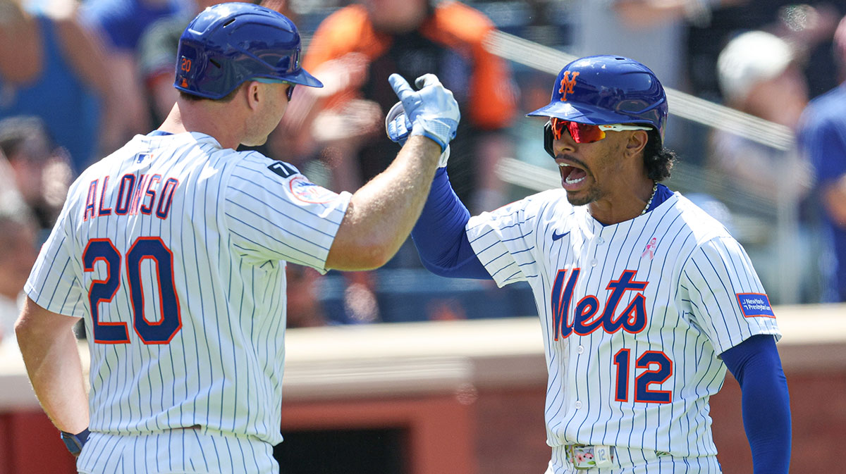 May 11, 2025; New York City, New York, USA; New York Mets shortstop Francisco Lindor (12) celebrates with first baseman Pete Alonso (20) after hitting a solo home run during the eighth inning against the Chicago Cubs at Citi Field. Mandatory Credit: Vincent Carchietta-Imagn Images