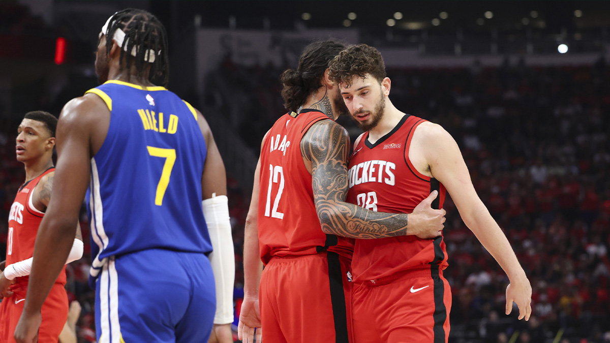 Houston Rockets center Steven Adams (12) talks with center Alperen Sengun (28) after a play during the third quarter against the Golden State Warriors at Toyota Center.