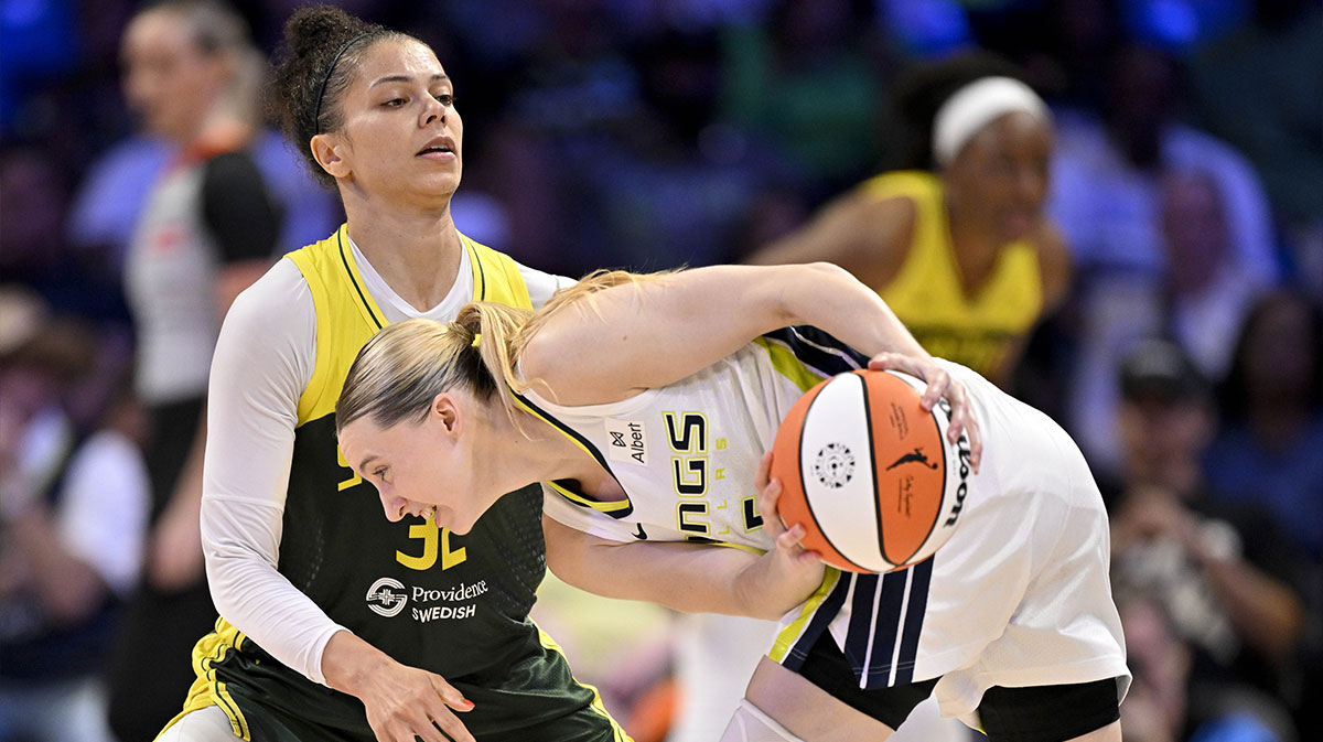 Dallas Wings guard Paige Bueckers (5) looks to move the ball past Seattle Storm forward Alysha Clark (32) during the second half at College Park Center.