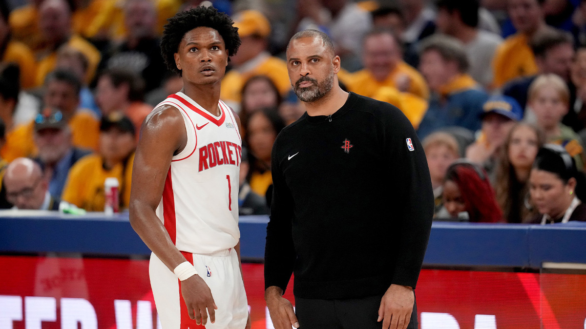Houston Rockets forward Amen Thompson (1) meets with Houston Rockets head coach Ime Udoka during a break in the action against the Golden State Warriors in the fourth quarter of game six of the first round for the 2025 NBA Playoffs at Chase Center.