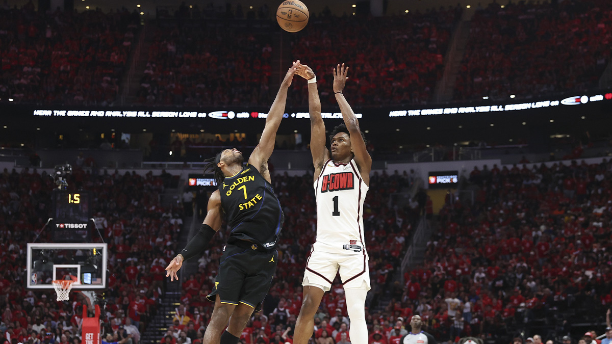 Houston Rockets forward Amen Thompson (1) shoots the ball as Golden State Warriors guard Buddy Hield (7) defends during the third quarter of game seven of the first round for the 2025 NBA Playoffs at Toyota Center