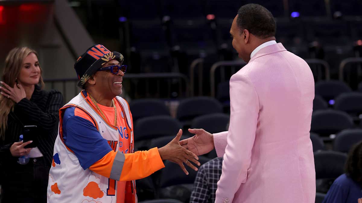 May 16, 2025; New York, New York, USA; American director Spike Lee (left) shakes hands with ESPN personality Stephen A. Smith before game six in the second round of the 2025 NBA Playoffs between the New York Knicks and the Boston Celtics at Madison Square Garden. Mandatory Credit: Brad Penner-Imagn Images