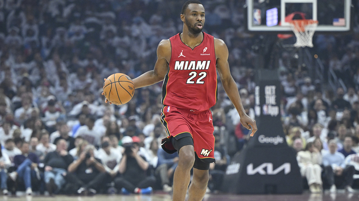 Miami Heat forward Andrew Wiggins (22) brings the ball up court in the first quarter against the Cleveland Cavaliers at Rocket Arena