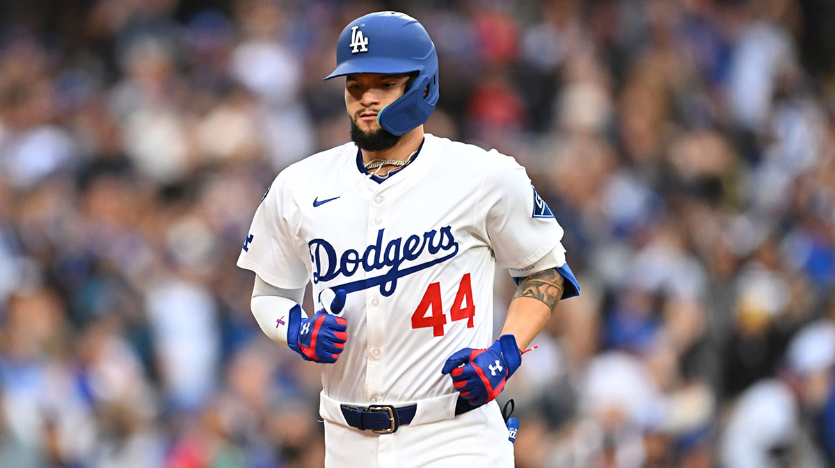 Los Angeles Dodgers outfielder Andy Pages (44) runs home to score after hitting a three run home run against the Los Angeles Angels in the first inning at Dodger Stadium.