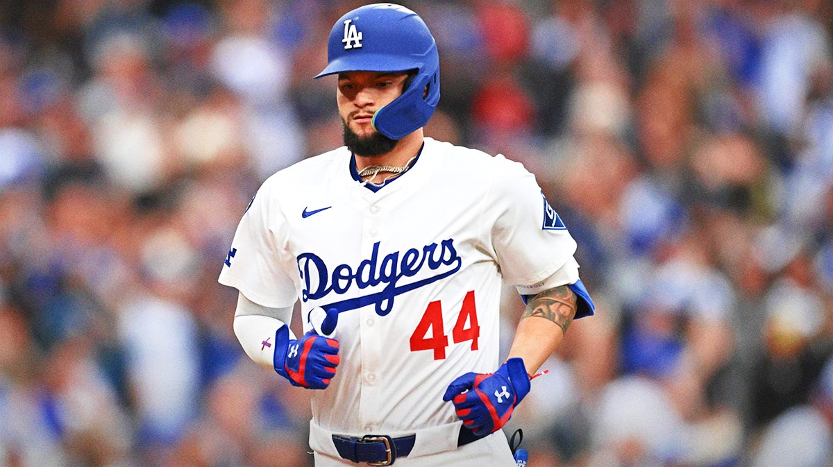 Los Angeles Dodgers outfielder Andy Pages (44) runs home to score after hitting a three run home run against the Los Angeles Angels in the first inning at Dodger Stadium.