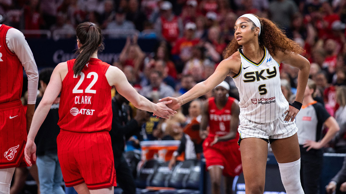 ; Indiana Fever guard Caitlin Clark (22) and Chicago Sky forward Angel Reese (5) shake hands before the game at Gainbridge Fieldhouse.