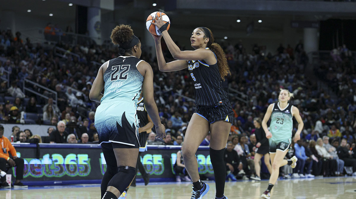 Chicago Sky forward Angel Reese (5) drives to the basket against New York Liberty forward Kennedy Burke (22) during the second half at Wintrust Arena.