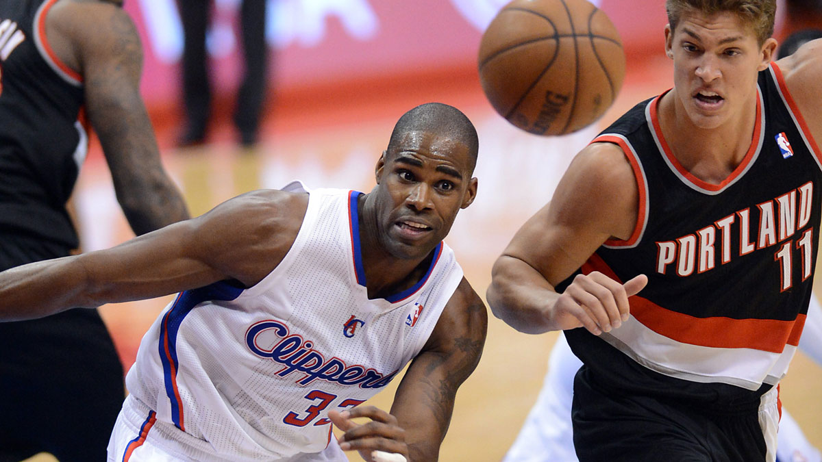Los Angeles Clippers power forward Antawn Jamison (33) and Portland Trail Blazers center Meyers Leonard (11) go for a rebound in the second half of the game at the Staples Center.