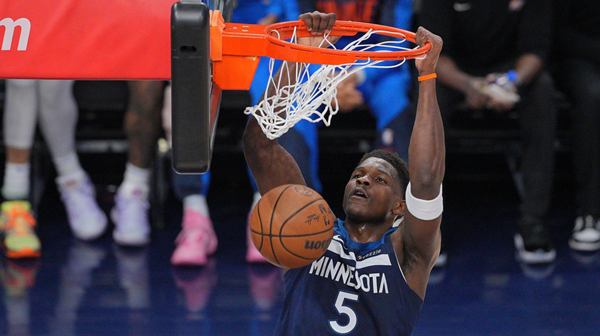 Minnesota Timberwolves guard Anthony Edwards (5) dunks the ball against the Oklahoma City Thunder during the first half in game three of the western conference finals for the 2025 NBA Playoffs at Target Center.