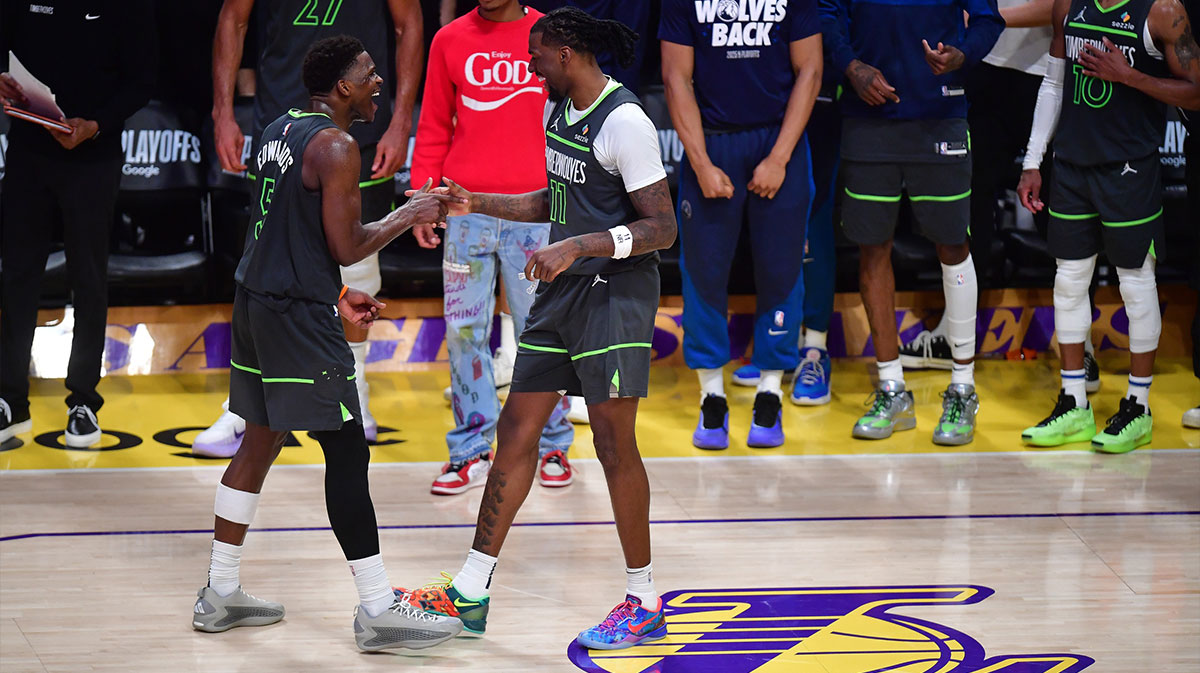 Minnesota Timberwolves guard Anthony Edwards (5) and center Naz Reid (11) celebrate the series victory against the Los Angeles Lakers in game five of first round for the 2025 NBA Playoffs at Crypto.com Arena.