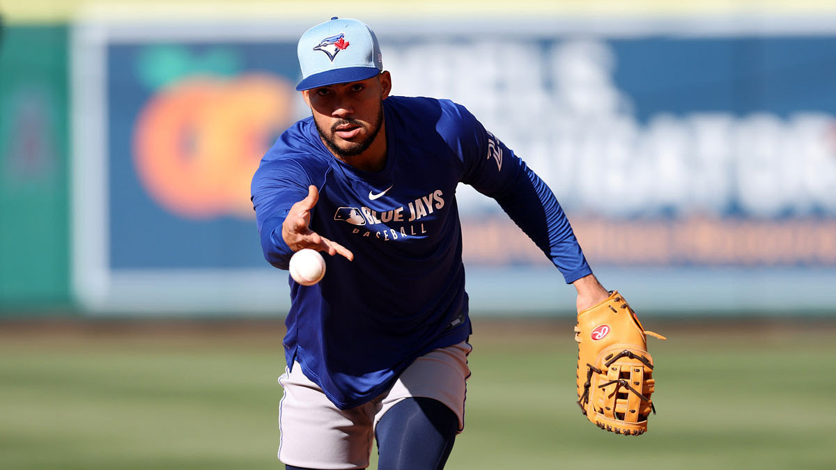 Toronto Blue Jays designated hitter Anthony Santander (25) tosses a ball before the game against the Los Angeles Angels.